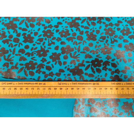 Jersey enduit fleurs bleues